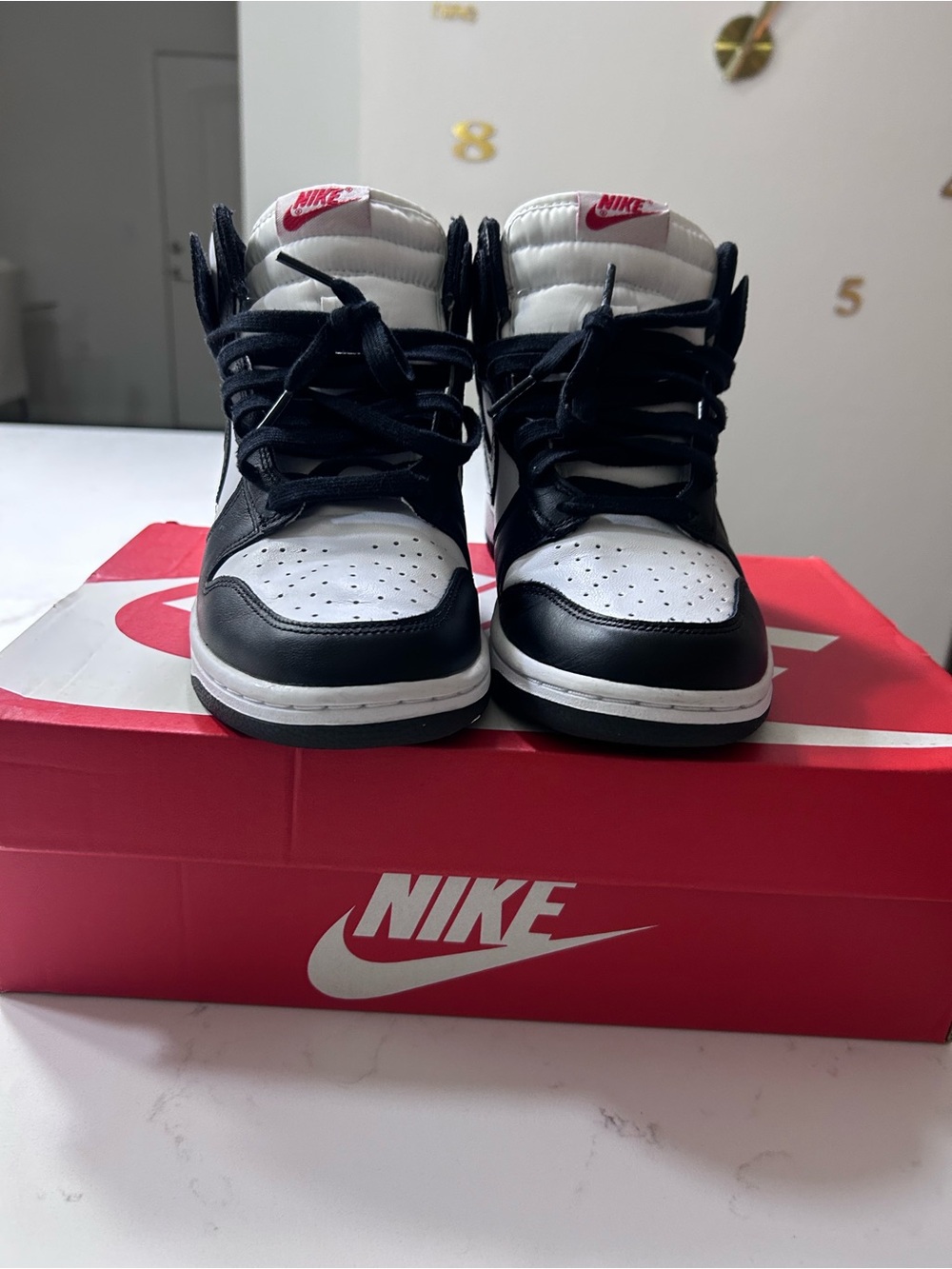 Nike Kids Black and White High-Top Sneakers with Red Logo